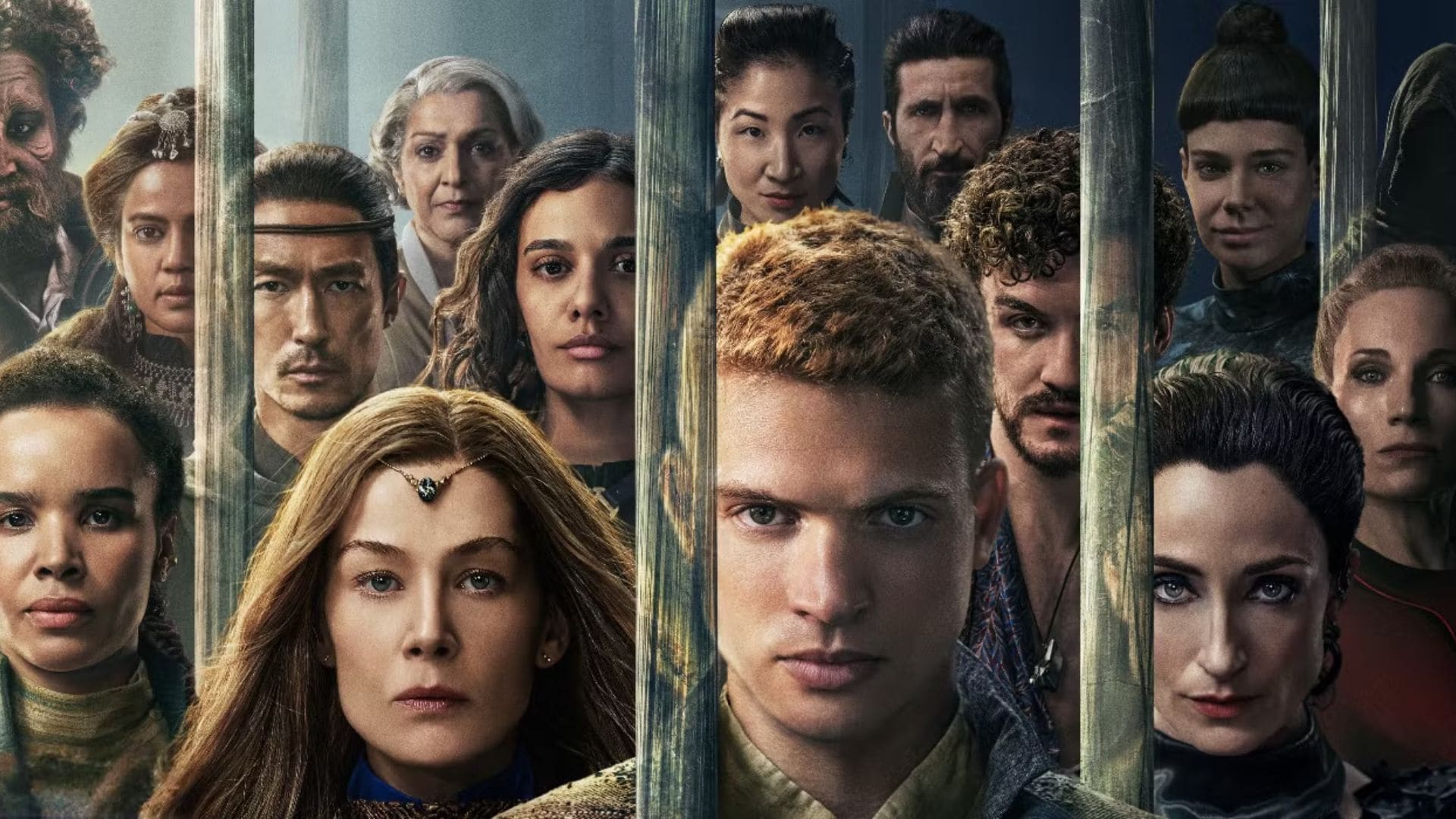 Imagem promocional da 3ª temporada de A Roda do Tempo com os personagens em trajes medievais olhando pra frente e separados por barras verticais.